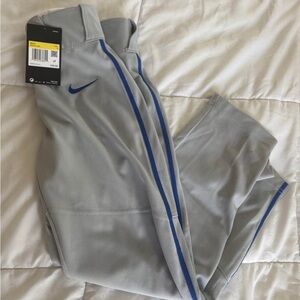 New with tags, baseball pants and 3 Nike belts